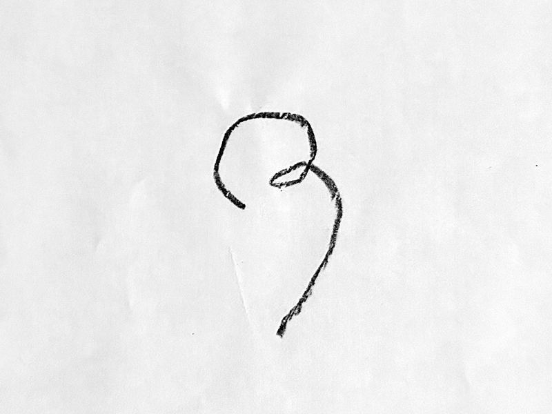 Cassie Spiral's handwritten R, drawn on paper and photographed as an object